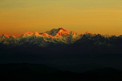 The breathtaking sunrise over the horizon of Khangchendzonga