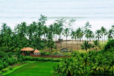 Lawns of Prakruti resort in Kashid overlooking the beach